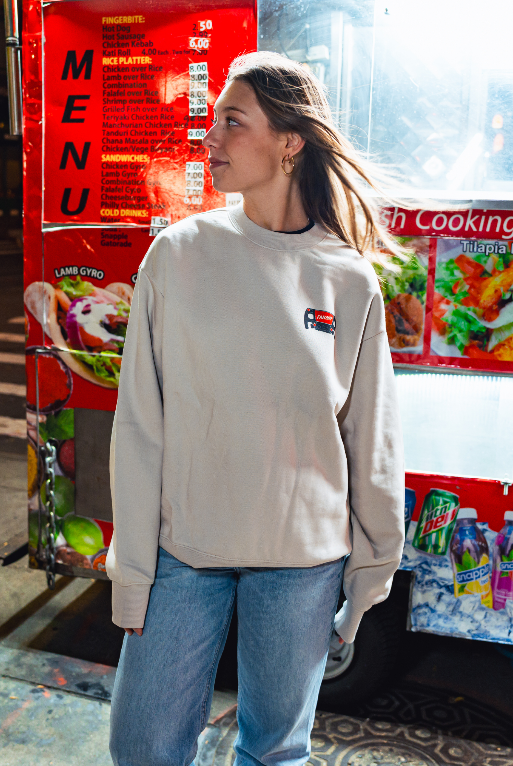 Model in NYC showing the front of the Bone Make The Pass crewneck