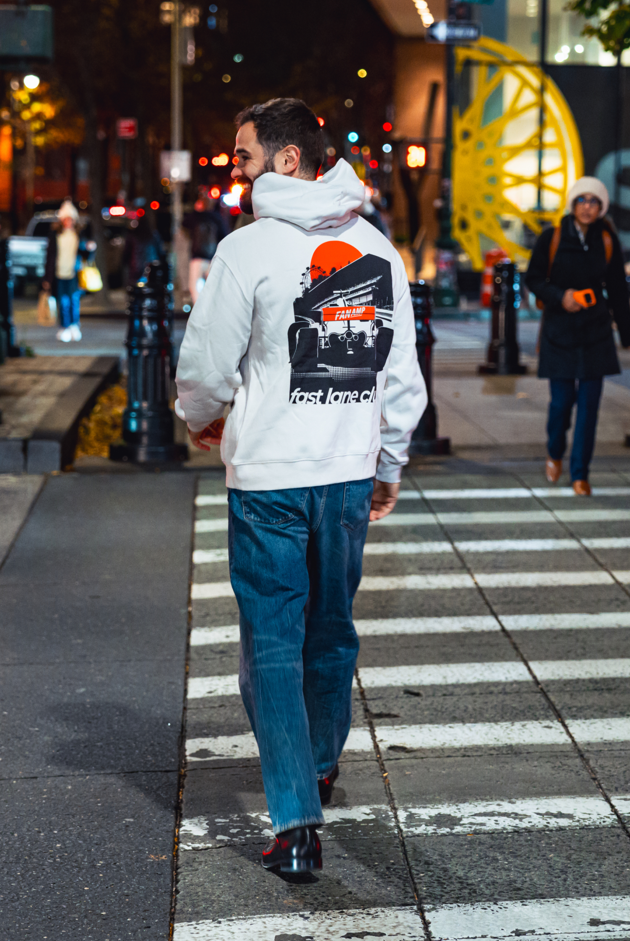 Model in NYC showing the back of the Bone Make The Pass hoodie