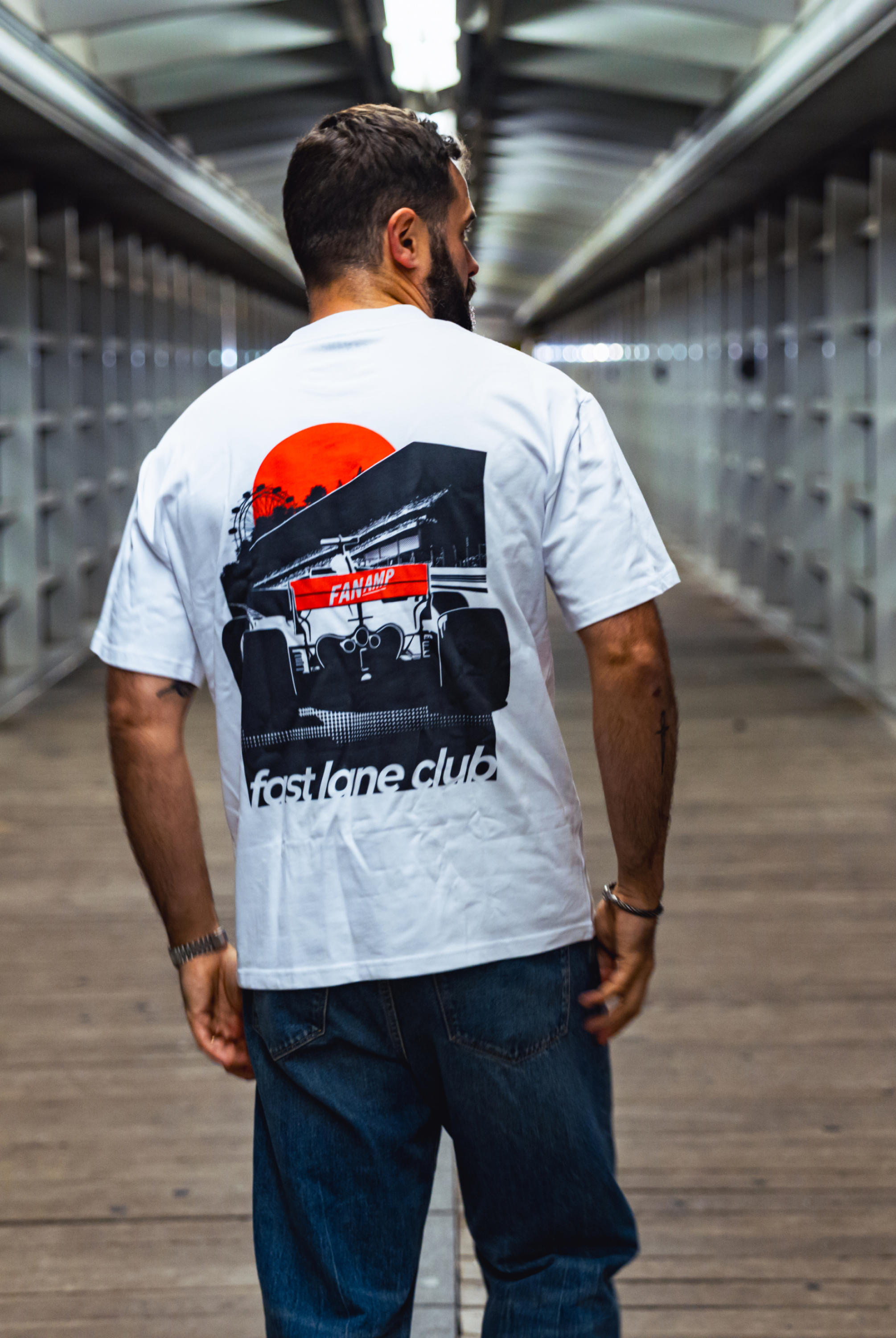 Model in NYC showing the back of the white Make The Pass t-shirt