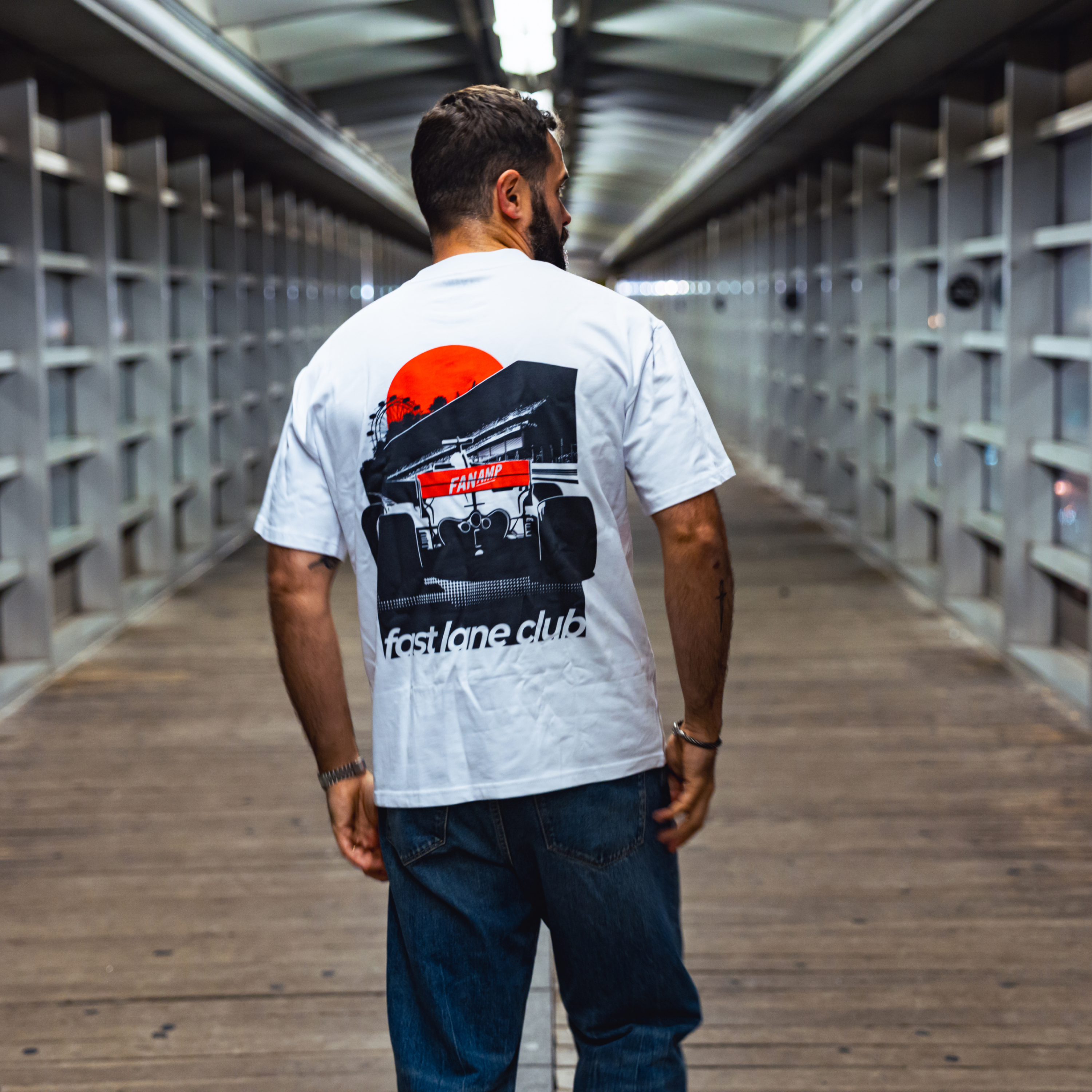 Model in NYC showing the back of the white Make The Pass t-shirt