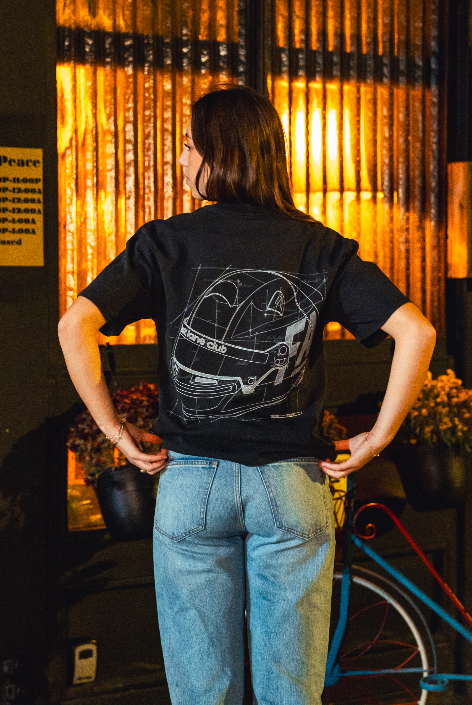 Model in NYC showing the back of the faded black Safety First t-shirt