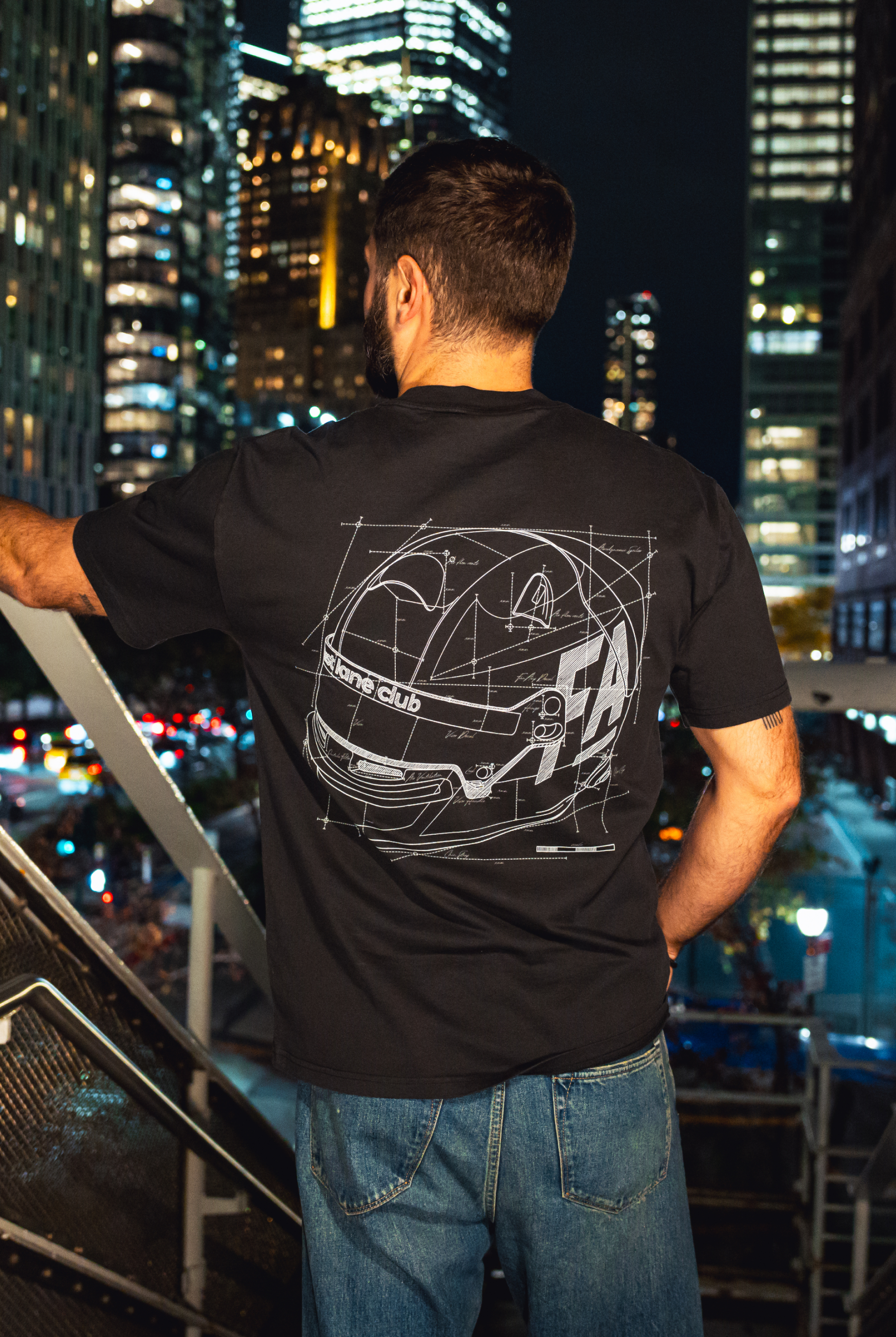 Model in NYC showing the back of the faded black Safety First t-shirt