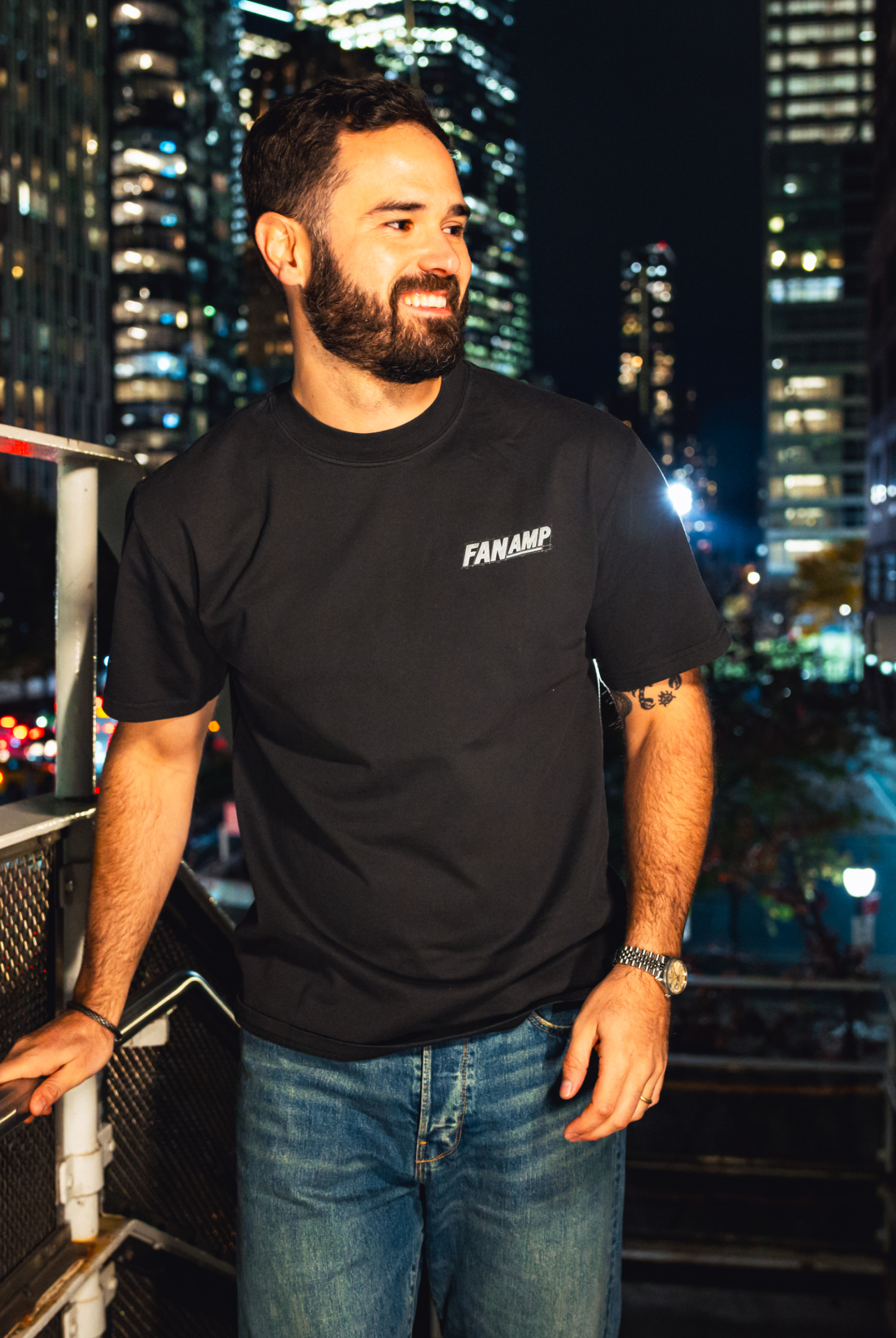 Model in NYC showing the front of the faded black Safety First t-shirt
