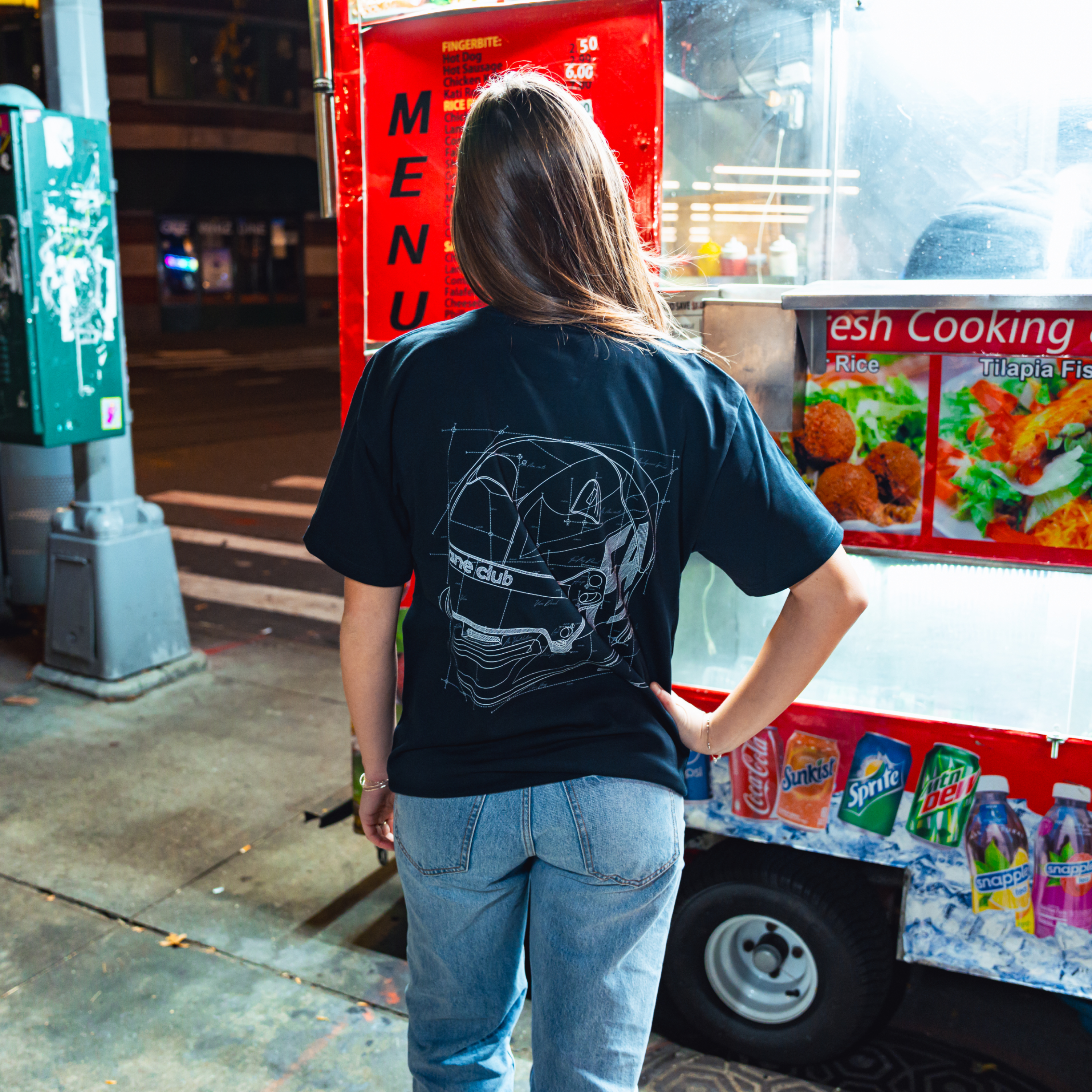 Model in NYC showing the back of the navy Safety First t-shirt