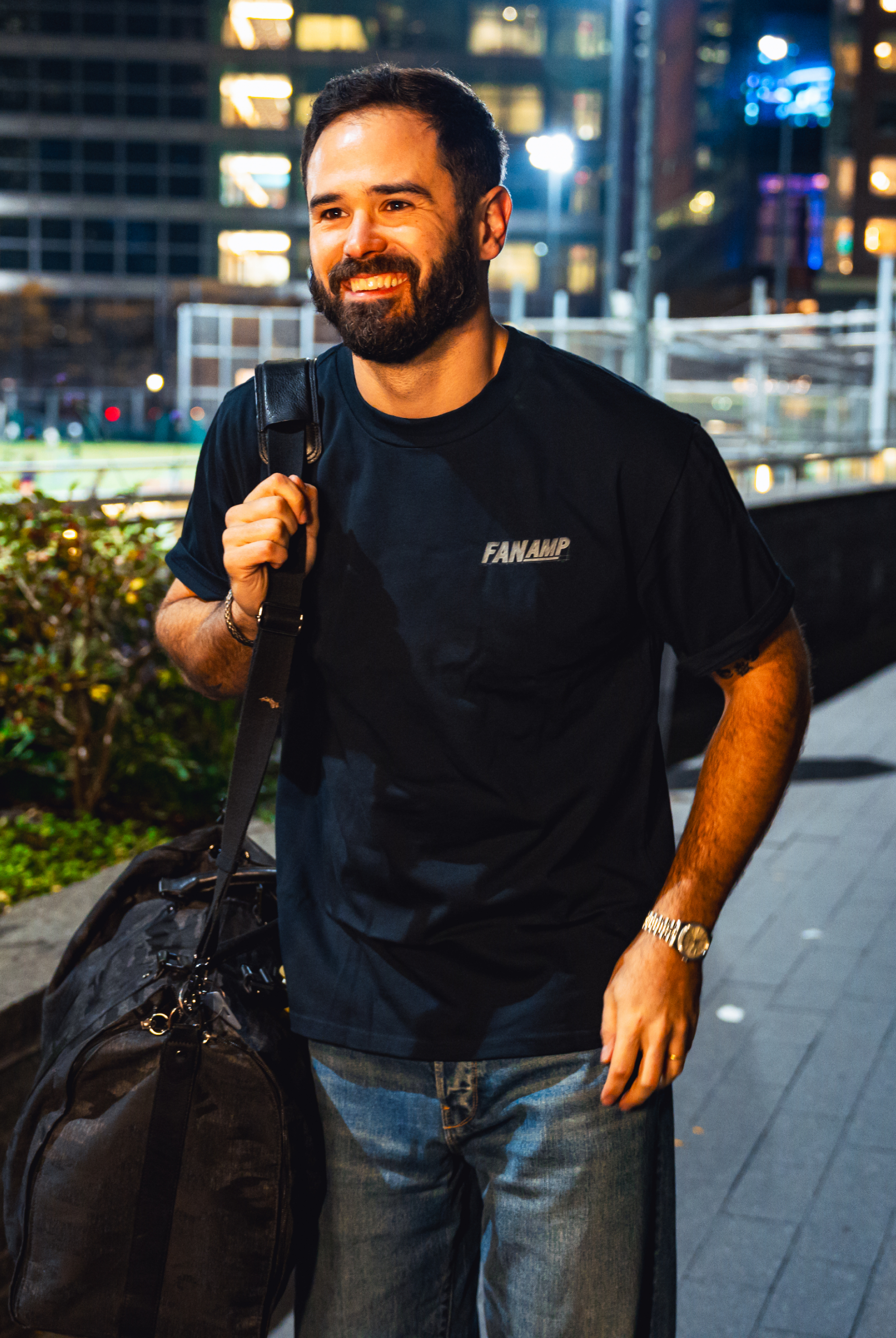 Model in NYC showing the front of the navy Safety First t-shirt