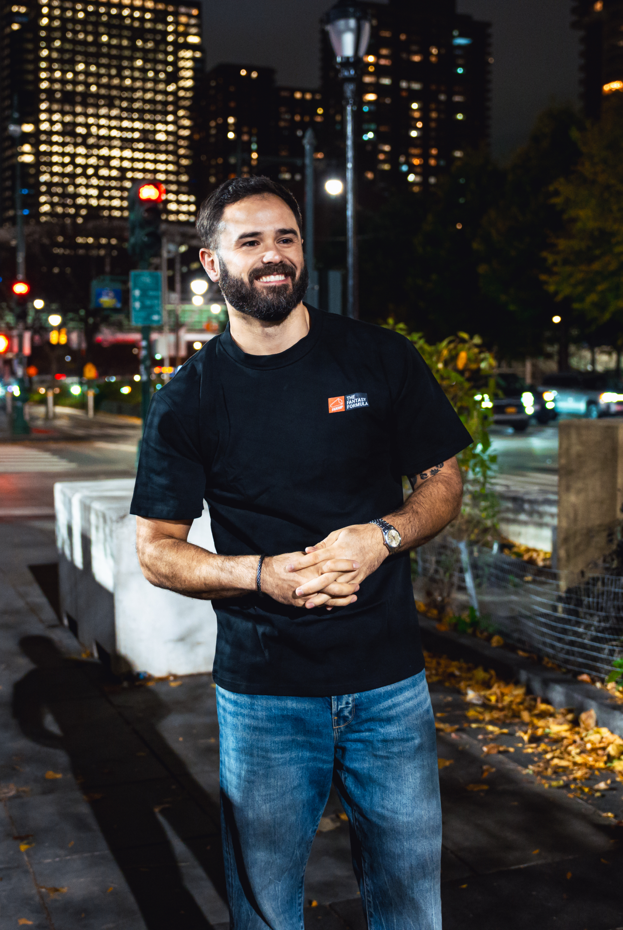 Model in NYC showing the front of the Black Fantasy Strategist t-shirt