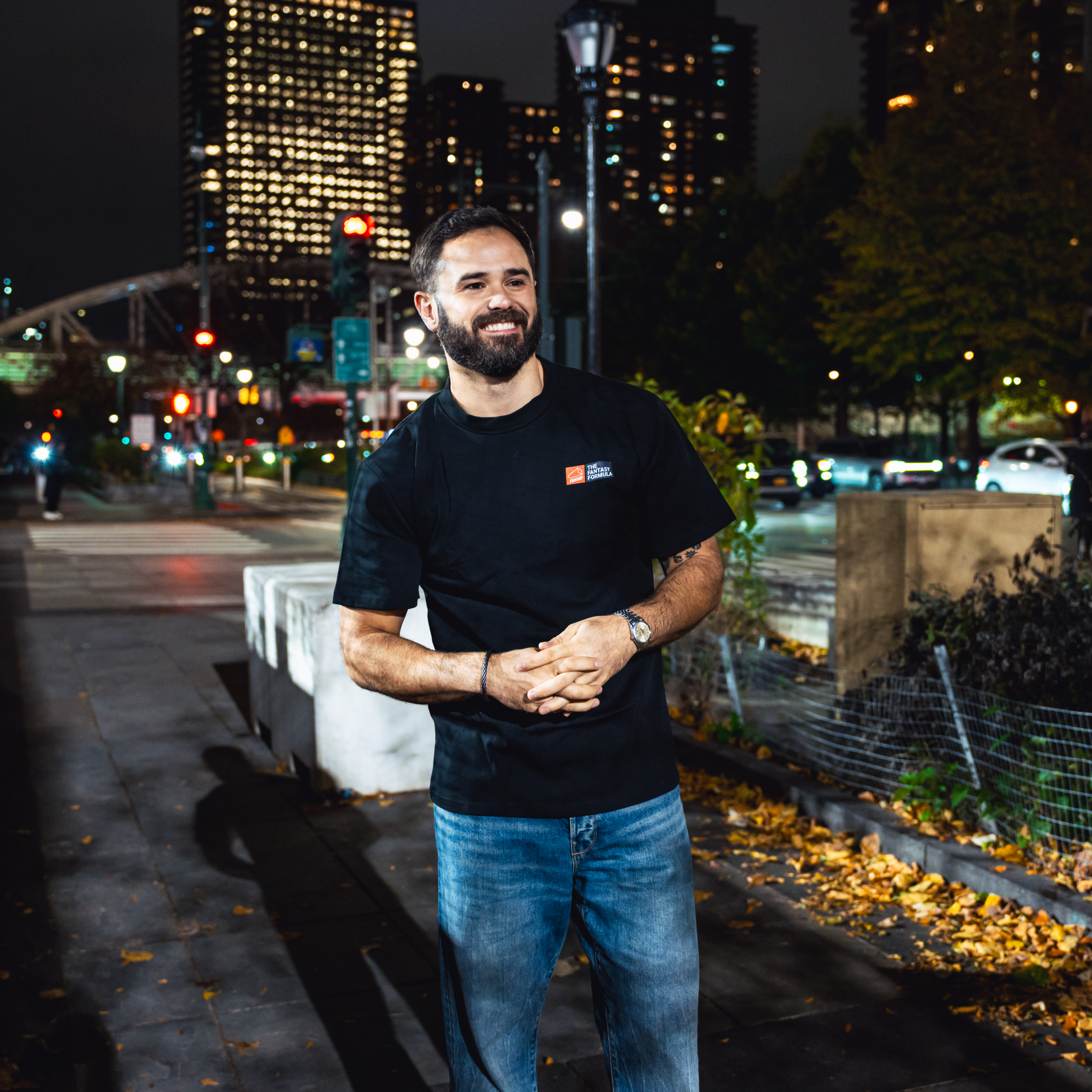 Model in NYC showing the front of the Black Fantasy Strategist t-shirt