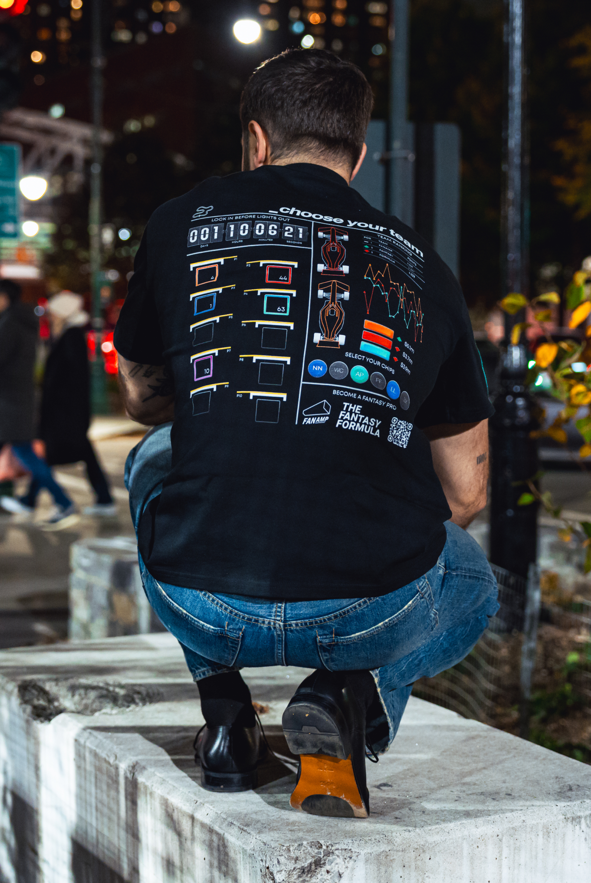 Model in NYC showing the back of the Black Fantasy Strategist t-shirt