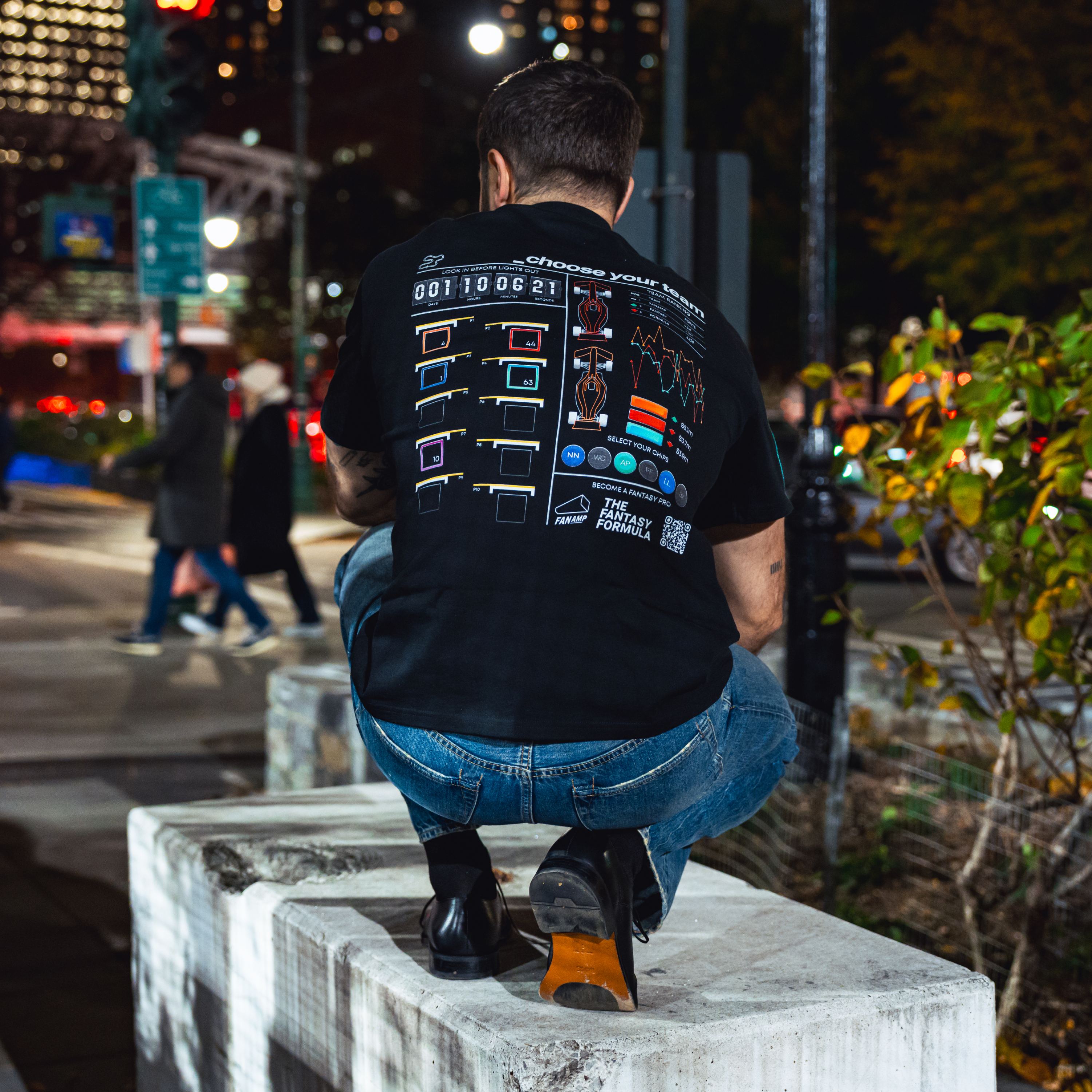 Model in NYC showing the back of the Black Fantasy Strategist t-shirt
