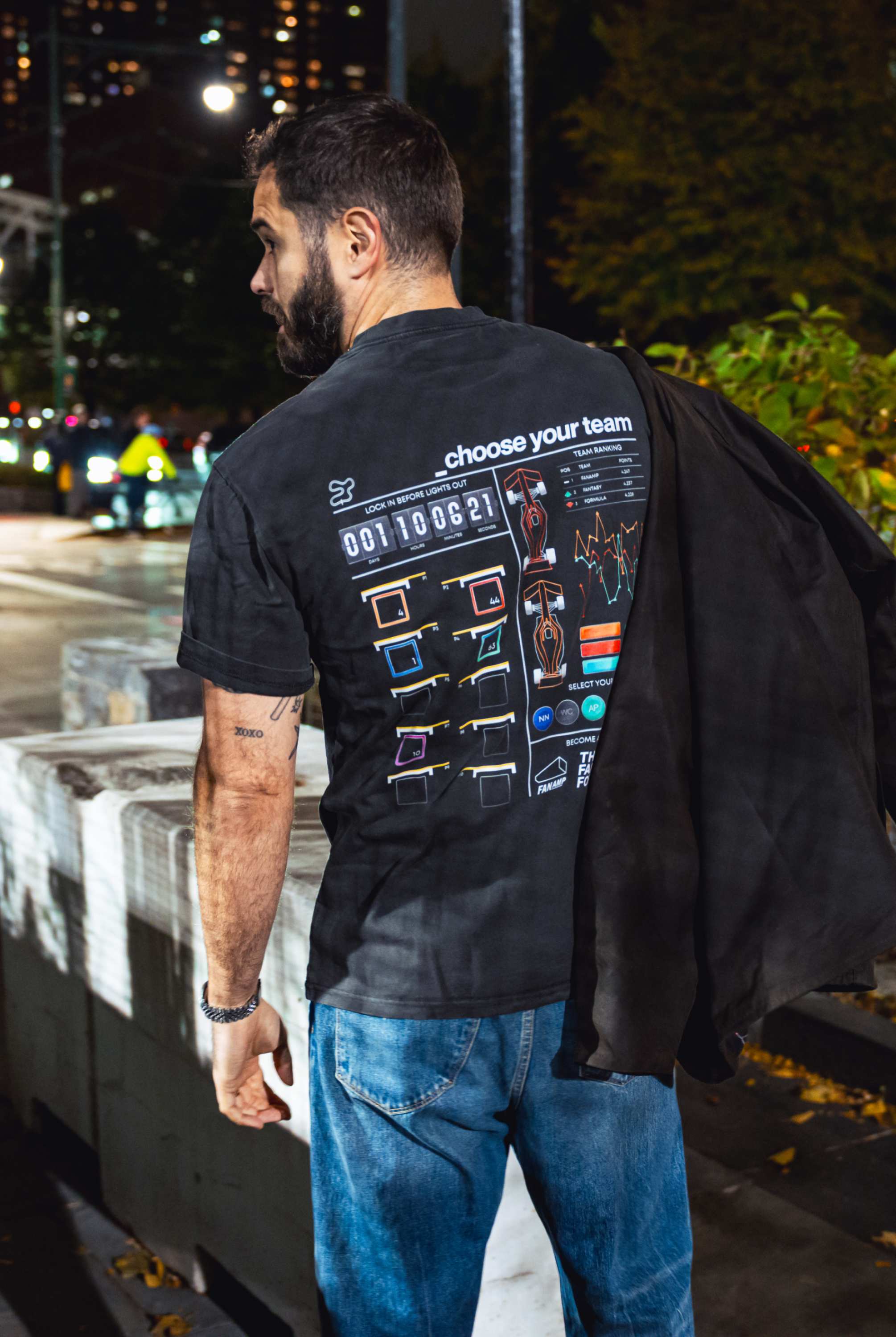 Model in NYC showing the back of the Faded Coal Fantasy Strategist t-shirt