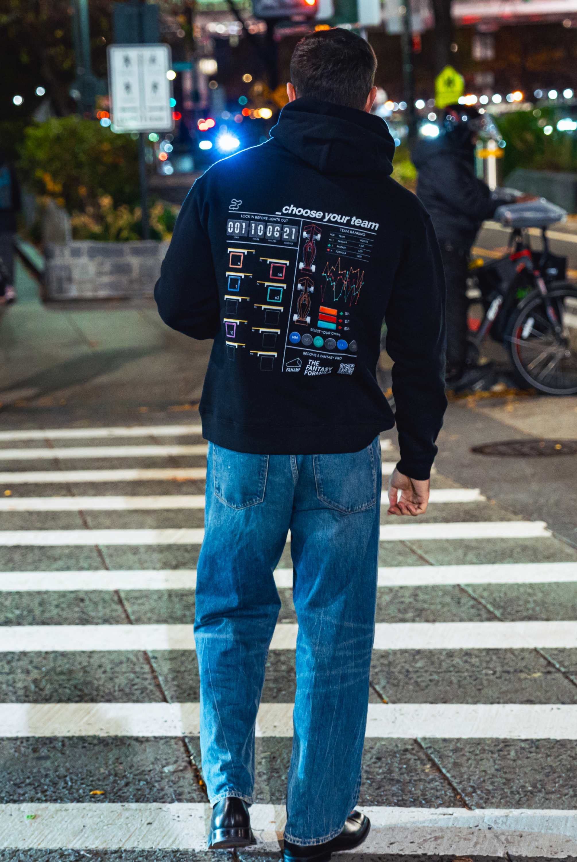 Model in NYC showing the back of the black Fantasy Strategist hoodie