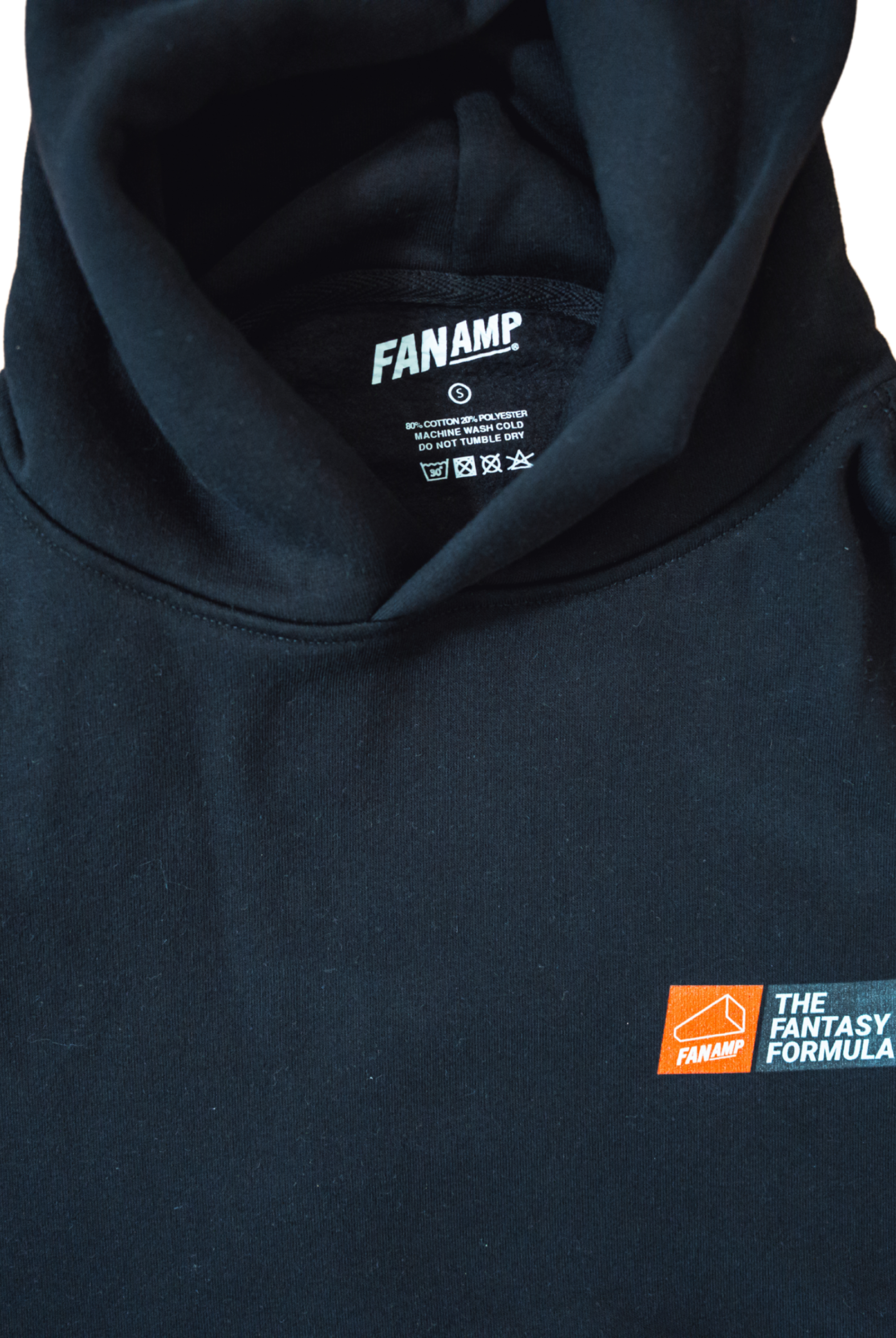 Close up of the tag of the Fantasy Strategist Black hoodie