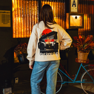 Model in NYC showing the back of the Bone Make The Pass crewneck
