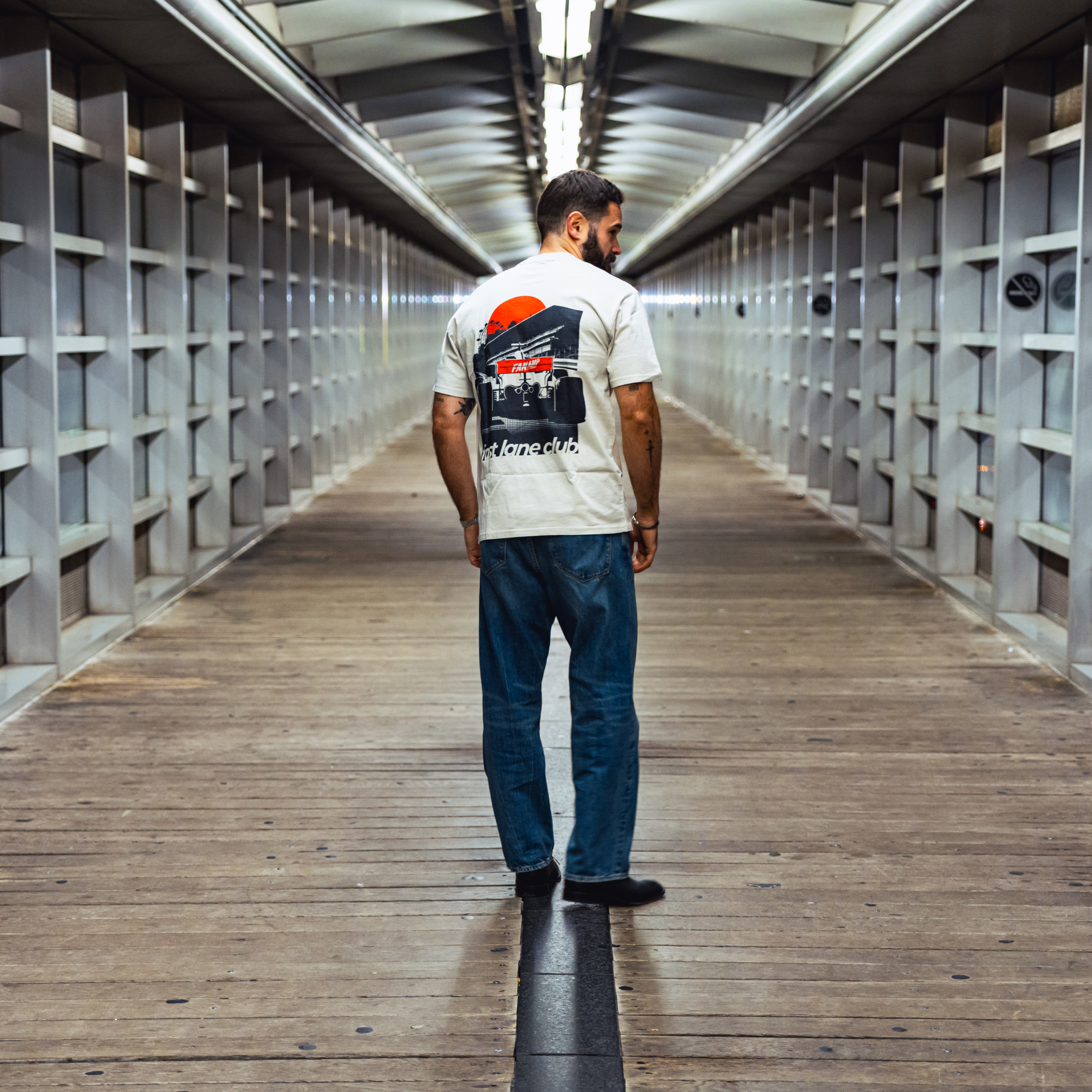 Model in NYC showing the back of the Faded Bone Make The Pass t-shirt