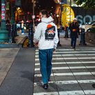 Model in NYC showing the back of the Bone Make The Pass hoodie
