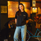 Model in NYC showing the front of the faded black Safety First t-shirt