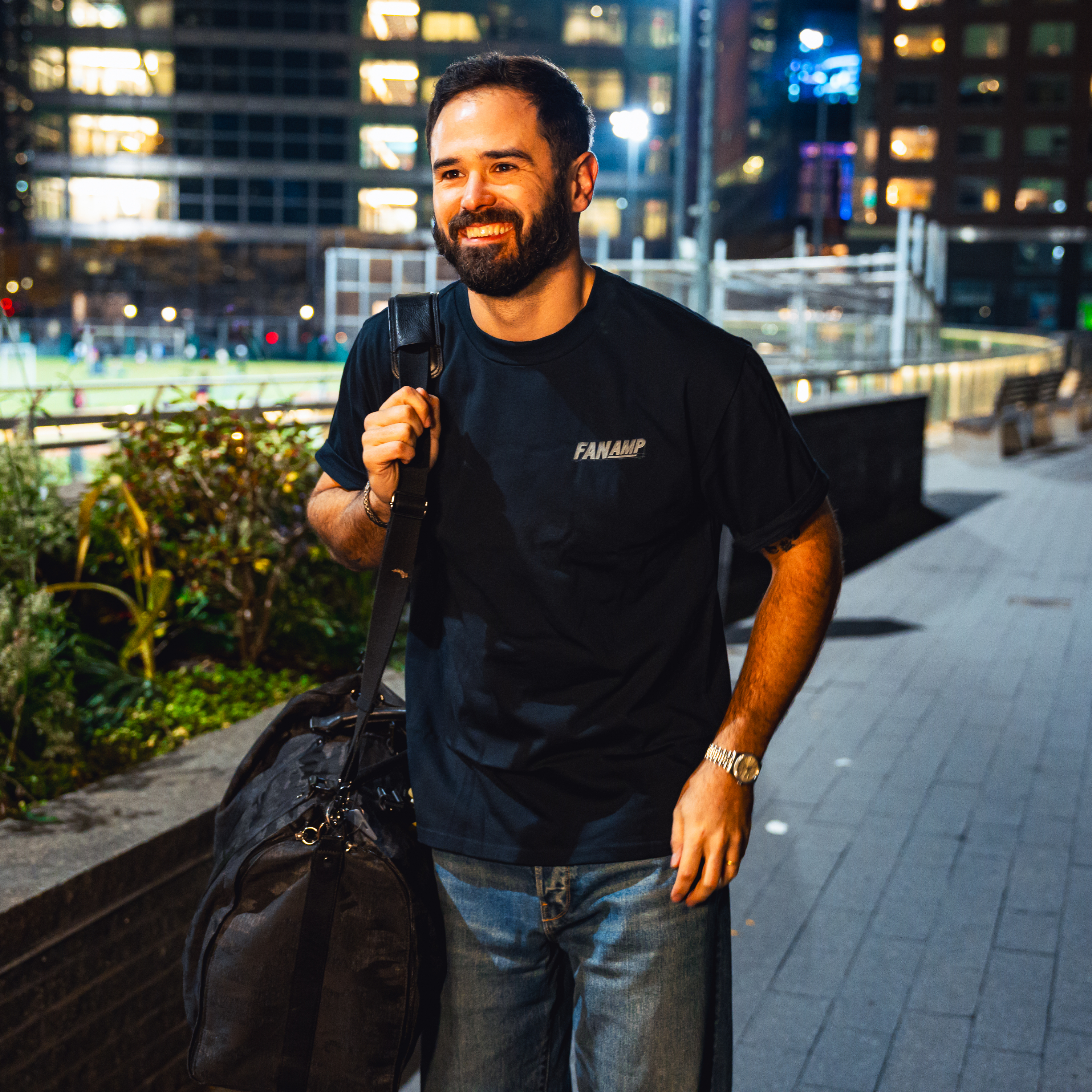 Model in NYC showing the front of the navy Safety First t-shirt