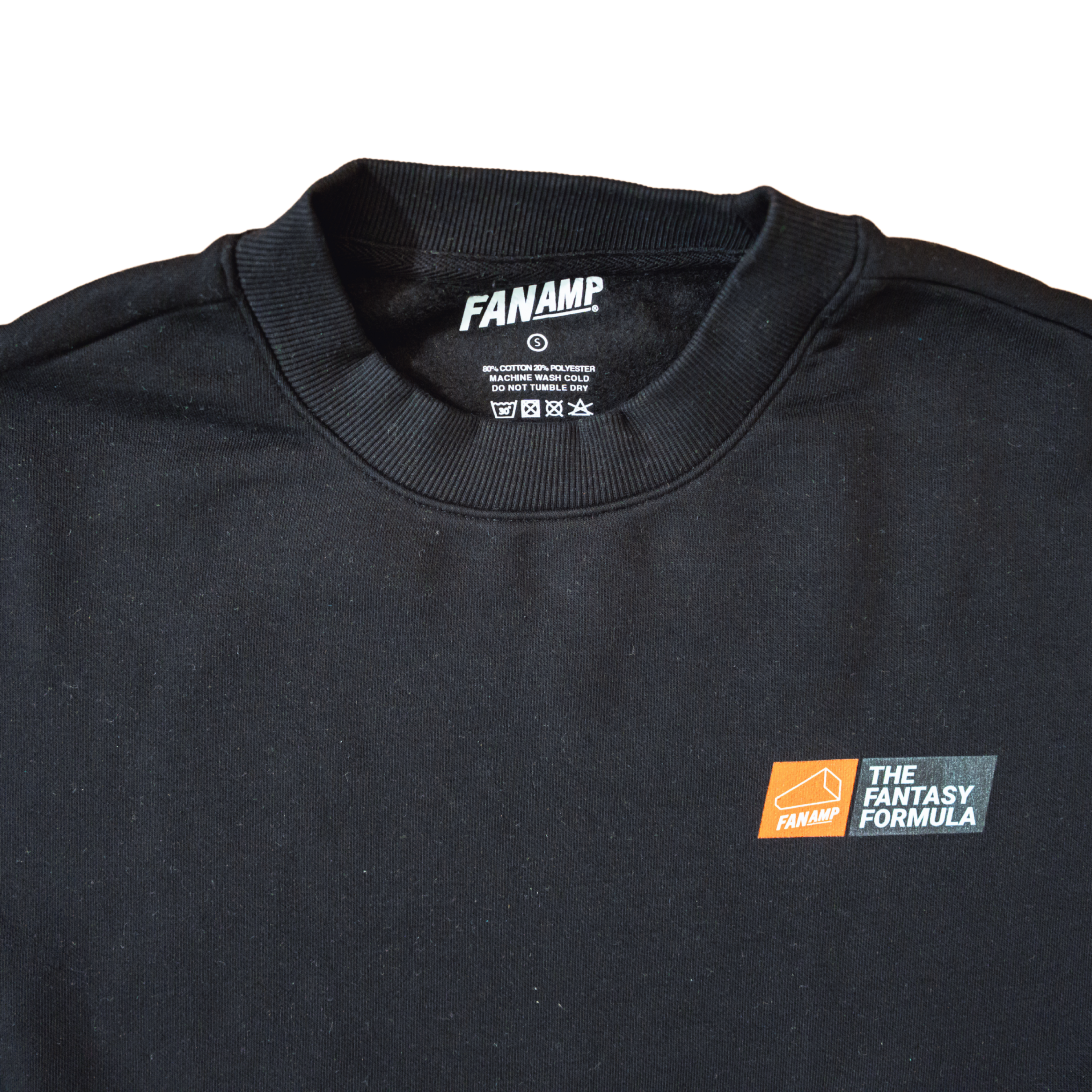 Close up of the tag of the Fantasy Strategist Black crewneck