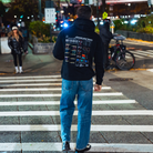 Model in NYC showing the back of the black Fantasy Strategist hoodie